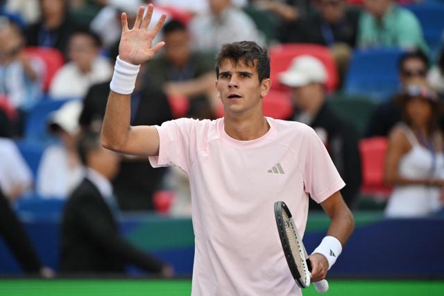 Spain's Rafael Jodar celebrates his victory against Netherlands Botic van de Zandschulp during their men's singles match at the Shanghai Masters tennis tournament in Shanghai on October 14, 2026. (Photo by Hector RETAMAL / AFP)