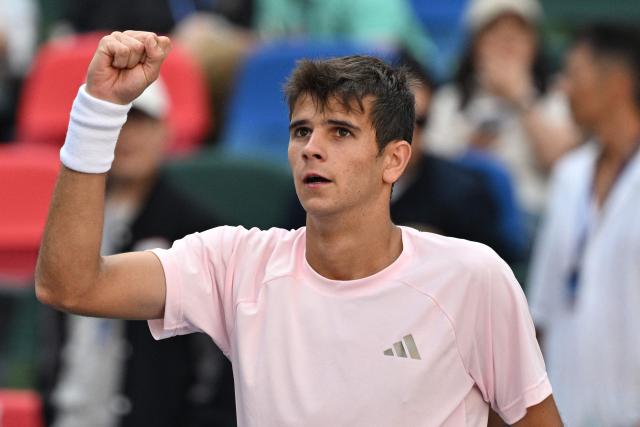Spain's Rafael Jodar celebrates his victory against Netherlands Botic van de Zandschulp during their men's singles match at the Shanghai Masters tennis tournament in Shanghai on October 14, 2026. (Photo by Hector RETAMAL / AFP)
