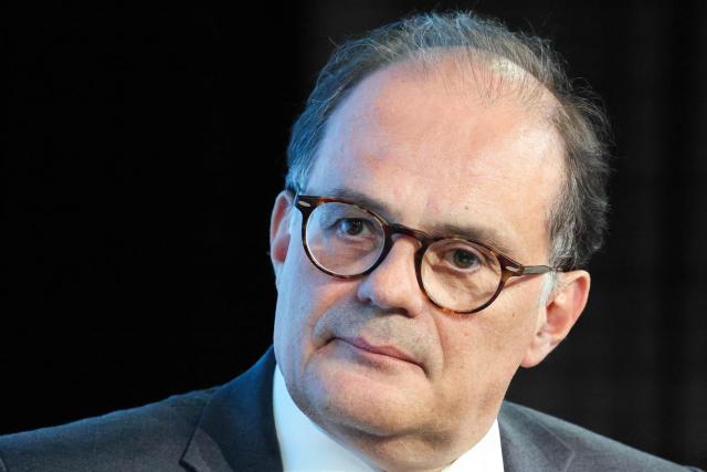 (FILES) Governor of the Bank of France Emmanuel Moulin delivers a speech during the 8th Paris Finance Forum (PFF) organised by Paris Europlace at the Pavillon Gabriel in Paris on June 9, 2026. Speaking in Bangkok, Bank of France Governor Emmanuel Moulin called on French political leaders to "shoulder their responsibilities" to ensure the adoption of a budget, in apparent reference to a constitutional provision that allows governments to force through legislation without a vote. (Photo by Ludovic MARIN / AFP)