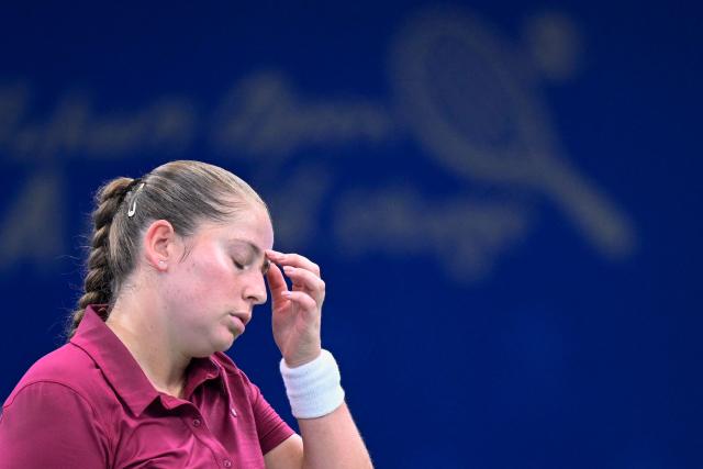 Latvia's Jelena Ostapenko reacts during her women's singles match against USA's Jessica Pegula at the Wuhan Open tennis tournament in Wuhan, China's Hubei province on October 14, 2026. (Photo by WANG Zhao / AFP)