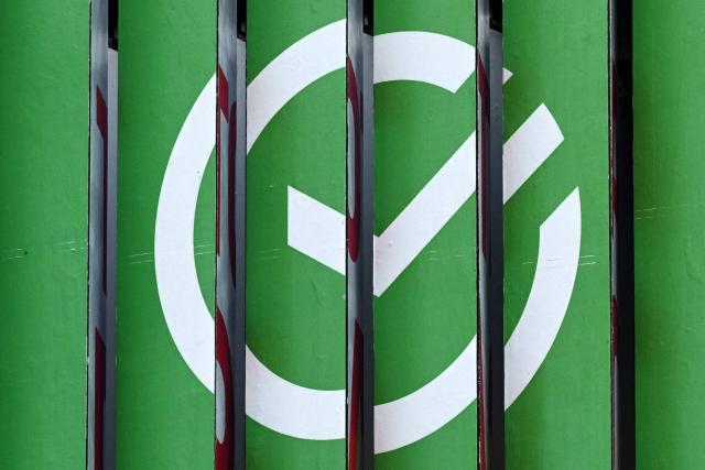 (FILES) This photograph taken on September 1, 2022 shows a logo of Sberbank, Russia's state-owned banking and financial services company, on a billboard in Moscow. A drone hit a data centre belonging to Russian state-owned lender Sberbank, a company executive said on October 14, 2026, adding that the bank's systems and services were operating normally. The attack is the latest in what appears to be a retaliatory campaign of Ukrainian strikes targeting Russian internet infrastructure. (Photo by Kirill KUDRYAVTSEV / AFP)