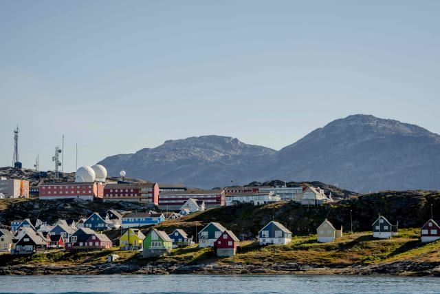 (FILES) A photo taken on September 6, 2026 shows houses and other buildings in Nuuk, Greenland. US President Donald Trump said on October 14, 2026 that oil, gas and mineral exploration was preparing to begin in Greenland, and hailed the Arctic island's position for US and European security. (Photo by Mads Claus Rasmussen / Ritzau Scanpix / AFP) / Denmark OUT