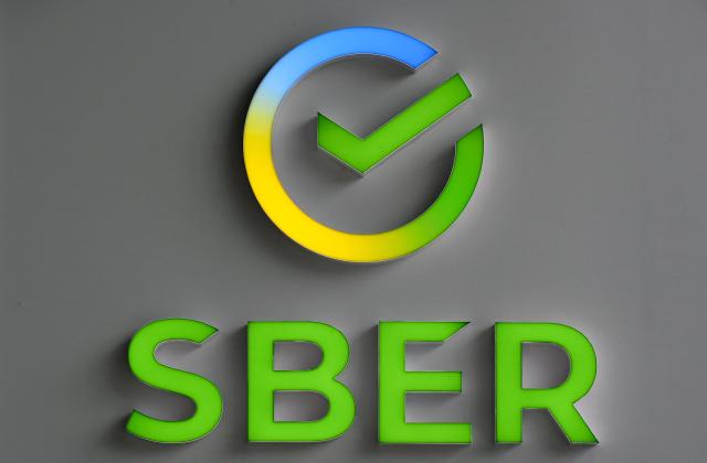 (FILES) A picture shows the logo of Russia's state-owned bank Sberbank during the St Petersburg International Economic Forum (SPIEF), at the ExpoForum convention and exhibition centre in Saint Petersburg, on June 15, 2022. A drone hit a data centre belonging to Russian state-owned lender Sberbank, a company executive said on October 14, 2026, adding that the bank's systems and services were operating normally. The attack is the latest in what appears to be a retaliatory campaign of Ukrainian strikes targeting Russian internet infrastructure. (Photo by Olga MALTSEVA / AFP)