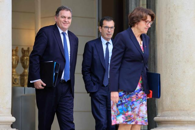 France's Transports Minister Philippe Tabarot, France's Labour Minister Jean-Pierre Farandou and France's Agriculture Minister Annie Genevard leave the presidential Elysee Palace following the weekly Cabinet meeting in Paris on October 14, 2026. (Photo by Ludovic MARIN / AFP)