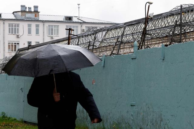 A person walks past Moscow's high-security Lefortovo prison, used to jail those being investigated by the FSB security services, on October 14, 2026. Tokyo said on October 14, 2026 it had urged Moscow to ensure "fair and impartial treatment" of a Japanese journalist who was arrested by Russia on suspicion of espionage. Moscow accused the man -- Yuki Imai, a reporter with the Hokkaido Shimbun newspaper -- of working for Japanese intelligence to collect information about Russia's defensive capabilities on the Far East island of Sakhalin. (Photo by TATYANA MAKEYEVA / AFP)