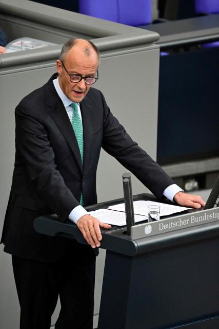 German Chancellor Friedrich Merz addresses delegates on October 14, 2026 at the Bundestag (lower house of parliament) in Berlin, on the eve of a two-day EU summit to take place in Brussels from October 15 to 16. (Photo by John MACDOUGALL / AFP)