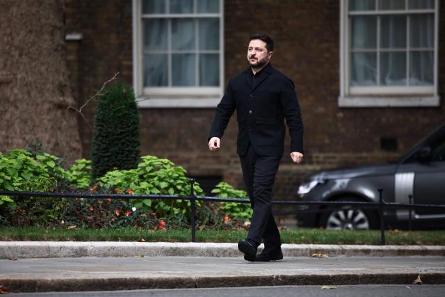 Ukraine's President Volodymyr Zelensky arrives to meet with Britain's Prime Minister Andy Burnham at 10 Downing Street, in central London, on October 14, 2026. (Photo by Henry Nicholls / POOL / AFP)