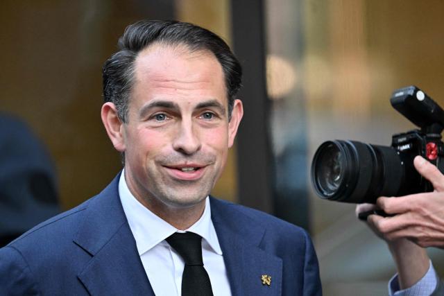President of Belgian and Flemish far-right party Vlaams Belang (VB) Tom Van Grieken arrives to attend a meeting of Patriots parliamentary group on the eve of an EU Summit in Brussels on October 14, 2026. (Photo by Nicolas TUCAT / AFP)