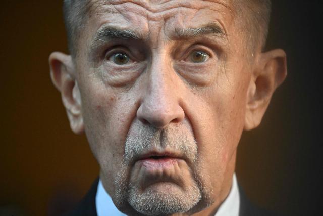 Czech Prime Minister Andrej Babis answers journalists' questions as he arrives to attend a meeting of Patriots parliamentary group on the eve of an EU Summit in Brussels on October 14, 2026. (Photo by Nicolas TUCAT / AFP)
