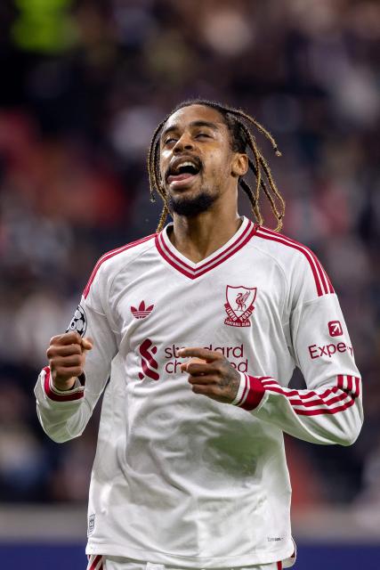 Liverpool's French midfielder #29 Bradley Barcola celebrates scoring the 0-3 goal with his teammates during the UEFA Champions League football match between LASK and Liverpool FC in Linz, Austria on October 14, 2026. (Photo by Branislav Racko / AFP)