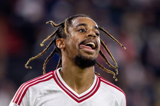 Liverpool's French midfielder #29 Bradley Barcola celebrates scoring the 0-3 goal with his teammates during the UEFA Champions League football match between LASK and Liverpool FC in Linz, Austria on October 14, 2026. (Photo by Branislav Racko / AFP) / ALTERNATIVE CROP