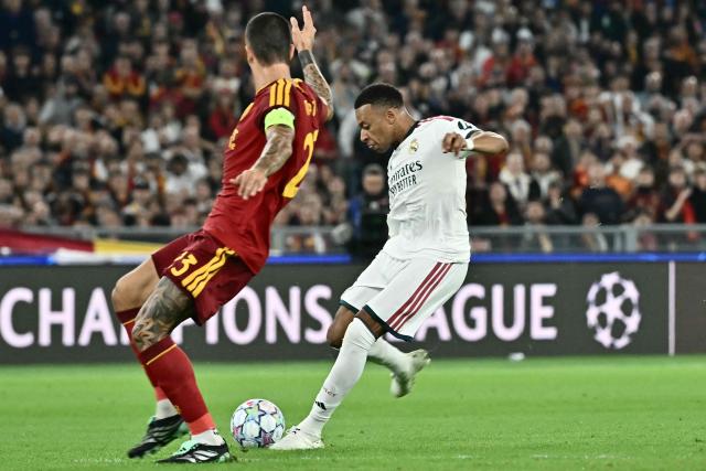 Real Madrid's French forward #10 Kylian Mbappe kicks and scores his team first goal  during the UEFA Champions League - 1st round day 2 football match between AS Roma and Real Madrid at the Olympic Stadium in Rome on October 14, 2026. (Photo by Filippo MONTEFORTE / AFP)