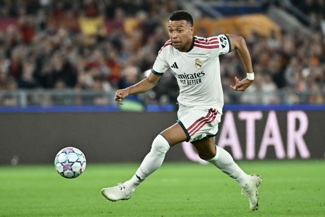 Real Madrid's French forward #10 Kylian Mbappe prepares to score a goal during the UEFA Champions League - 1st round day 2 football match between AS Roma and Real Madrid at the Olympic Stadium in Rome on October 14, 2026. (Photo by Filippo MONTEFORTE / AFP)