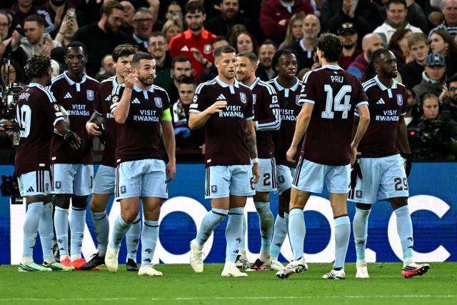 Aston Villa's English midfielder #06 Ross Barkley (C) celebrates scoring the team's fourth goal  during the UEFA Champions League, league phase football match between Aston Villa and Fenerbahce at Villa Park in Birmingham, central England on October 14, 2026. (Photo by Paul ELLIS / AFP)