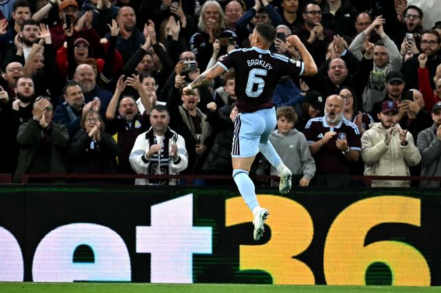 Aston Villa's English midfielder #06 Ross Barkley celebrates scoring the team's fourth goal  during the UEFA Champions League, league phase football match between Aston Villa and Fenerbahce at Villa Park in Birmingham, central England on October 14, 2026. (Photo by Paul ELLIS / AFP)