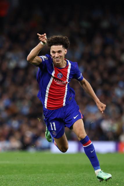Paris Saint-Germain's French midfielder #11 Maghnes Akliouche celebrates after scoring their fourth goal during the UEFA Champions League, league phase football match between Manchester City and Paris Saint Germain at the Etihad Stadium in Manchester, north west England, on October 14, 2026. (Photo by FRANCK FIFE / AFP)