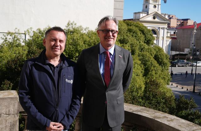 Punta Arenas Mayor Claudio Radonich (L) meets with British Ambassador to Chile David Concar during a meeting in Punta Arenas, Chile, on October 14, 2026. Business leaders from Chile and the Falkland Islands met in Punta Arenas, southern Chile, in September to finalize details of a new commercial shipping route, which is scheduled to begin operating between November and December 2026. (Photo by Claudio MONGE / AFP)