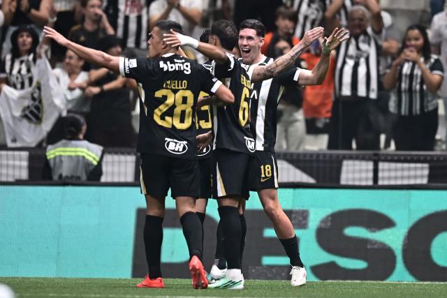 Atletico Mineiro's Uruguayan forward #18 Thiago Borbas (R) celebrates with teammates after scoring his team's third goal during the Copa Sudamericana semifinal first leg football match between Brazil's Atletico Mineiro and Uruguay's Montevideo City Torque at the Arena MRV stadium in Belo Horizonte, Brazil on October 14, 2026. (Photo by GLEDSTON TAVARES / AFP)