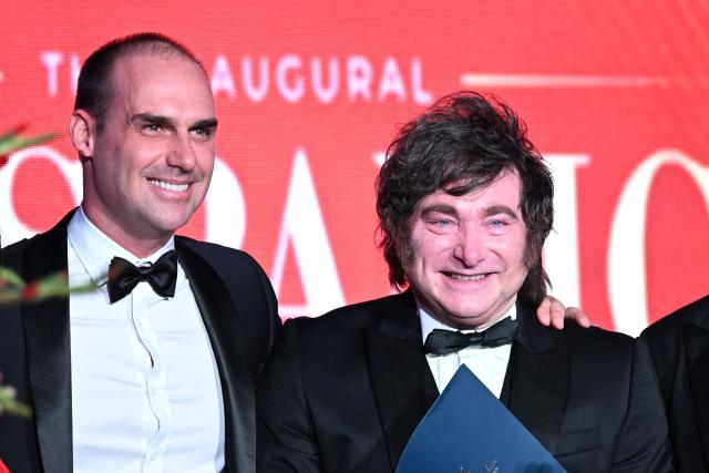 Argentina's President Javier Milei (R) and Brazilian politician Eduardo Bolsonaro, brother of Brazilian presidential candidate Flavio Bolsonaro, attends the Hispanic Heritage Gala in Washington, DC on October 14, 2026. (Photo by Alex WROBLEWSKI / AFP)