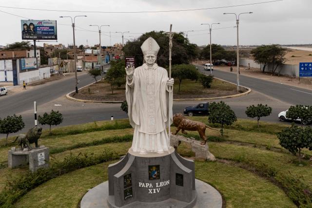 A statue of Pope Leo XIV is pictured in Chiclayo, Lambayeque department, northern Peru, on October 12, 2026. In northern Peru, the self-anointed "city of Pope Leo XIV" is feverishly preparing for a visit by its former bishop, despite the pontiff's lung cancer diagnosis raising doubts over his travel plans. (Photo by Ernesto BENAVIDES / AFP)