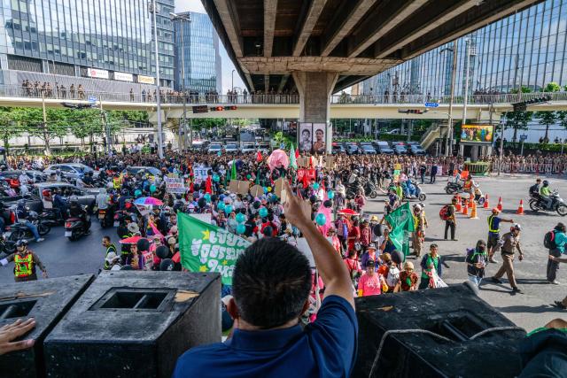 Demonstrators take part in a protest against the International Monetary Fund (IMF) and World Bank Group in Bangkok on October 15, 2026, as the IMF Annual Meetings take place in the Thai capital. (Photo by ANTHONY WALLACE / AFP)