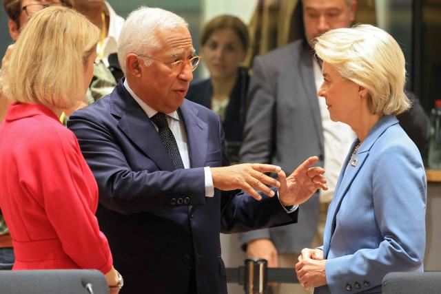 European Council President Antonio Costa (C) speaks with EU High Representative and Vice-President for Foreign Affairs and Security Policy Kaja Kallas (L)  and European Commission President Ursula von der Leyen (R) ahead of a round table as part of a European Union summit at the EU headquarters in Brussels on October 15, 2026. EU leaders head on October 15, 2026 for their biggest clash yet over the bloc's next long-term budget, as they race to lock in a deal before next year's French presidential election. (Photo by Ludovic MARIN / AFP)
