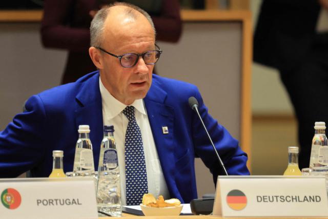Germany's Chancellor Friedrich Merz gets ready to take part in a round table as part of a European Union summit at the EU headquarters in Brussels on October 15, 2026. EU leaders head on October 15, 2026 for their biggest clash yet over the bloc's next long-term budget, as they race to lock in a deal before next year's French presidential election. (Photo by Ludovic MARIN / AFP)