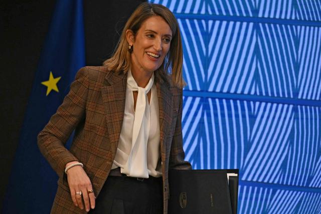 European Parliament President Roberta Metsola arrives to give a press conference on the sidelines of a European Union summit at the EU headquarters in Brussels on October 15, 2026. EU leaders head on October 15, 2026 for their biggest clash yet over the bloc's next long-term budget, as they race to lock in a deal before next year's French presidential election. (Photo by NICOLAS TUCAT / AFP)