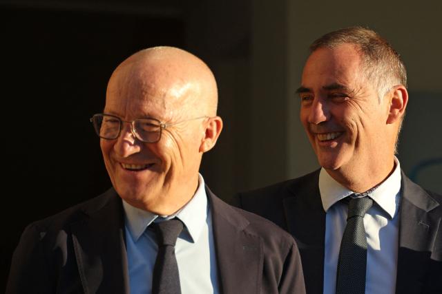 Corsican Executive Council President Gilles Giovannangeli (L) and Executive Council member in charge of autonomy and former Executive Council President Gilles Simeoni (R) stand together at the Corsican Assembly in Ajaccio on the French Mediterranean island of Corsica on October 15, 2026. (Photo by Pascal POCHARD-CASABIANCA / AFP)