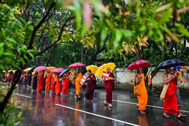 Buddhist monks march to the Sri Lankan president's office in Colombo on October 15, 2026 demanding a pardon for Galagodaatte Gnanasara, accused of fuelling anti-Muslim sentiment and religious tensions. (Photo by Ishara S. KODIKARA / AFP)