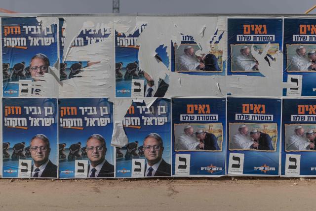 This photograph shows torn election posters of National Security Minister Itamar Ben Gvir's far-right Otzma Yehudit party in Netivot on October 15, 2026. Israel heads to the polls on October 27 in its first election since the October 7, 2023 Hamas-led attack, in what is seen as a referendum on the prime minister. (Photo by Ilia YEFIMOVICH / AFP)