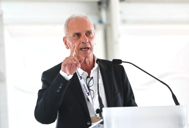 Founder, President and CEO of French logistics company Modal Group, Bernard Mei, gestures as he talks during the inauguration of the Port of Dunkirk’s new intermodal rail terminal in Loon-Plage near Dunkirk on October 15, 2026. (Photo by Francois LO PRESTI / AFP)