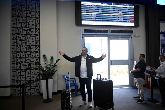 Gustavo Ruiz, state coordinator in Zulia for Vente Venezuela, the party led by opposition leader Maria Corina Machado, arrives at Simon Bolivar International Airport in Maiquetia, La Guaira state, Venezuela, on October 15, 2026, after a period in exile. (Photo by Federico PARRA / AFP)