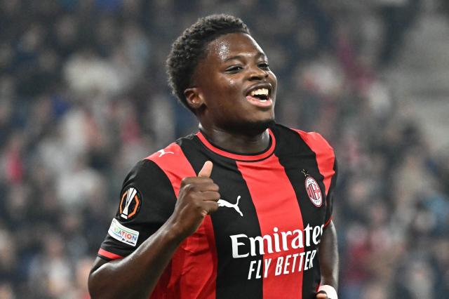 AC Milan's Italian midfielder #70 Alphadjo Cisse celebrates scoring the opening goal during the UEFA Europa League football match between Salzburg and AC Milan in Salzburg, on October 15, 2026. (Photo by Joe Klamar / AFP)