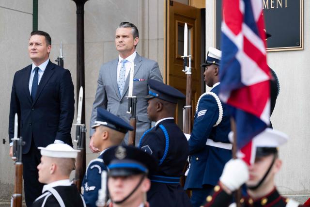 US Secretary of Defense Pete Hegseth during a welcoming ceremony ahead of a meeting with UK Defense Secretary Wes Streeting (L) at the Pentagon in Washington, DC on October 15, 2026. (Photo by SAUL LOEB / AFP)