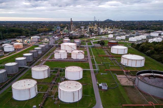 An aerial view shows the fuel depot of Aral at the Ruhr Oel petroleum refineries of BP Gelsenkirchen GmbH in Gelsenkirchen, western Germany on October 15, 2026. Ruhr Oel Gelsenkirchen refinery is one of the key production sites for fuels such as kerosene and diesel in Germany. (Photo by Ina FASSBENDER / AFP)