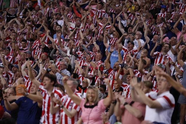 Sunderland supporters cheer after their second goal during the Europa League round 1 day 2 football match between SCU Torreense and Sunderland AFC at the Dr. Magalhaes Pessoa Stadium in Leiria on October 15, 2026. (Photo by FILIPE AMORIM / AFP)