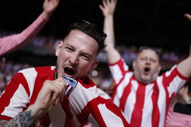 Sunderland supporters cheer after their second goal during the Europa League round 1 day 2 football match between SCU Torreense and Sunderland AFC at the Dr. Magalhaes Pessoa Stadium in Leiria on October 15, 2026. (Photo by FILIPE AMORIM / AFP)