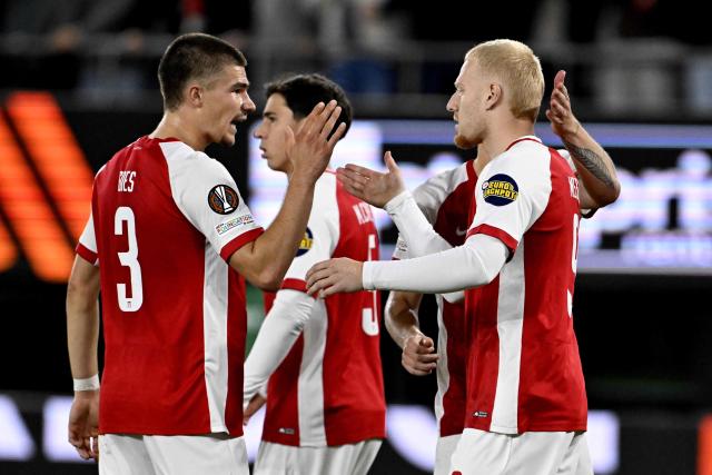 AZ Alkmaar's forward #09 Mexx Meerdink (R) celebrates scoring his team's second goal during the UEFA Europa League, league phase matchday 2, football match between AZ Alkmaar and Hapoel Beer Sheva at the AFAS Stadion in Alkmaar, on October 15, 2026. 2026-10-15 20:19:30 ALKMAAR - Mexx Meerdink of AZ with the 2-1 during the Europa League match between AZ Alkmaar and Hapoel Beer-Sheva at the AFAS Stadium on October 15, 2026 in Alkmaar, the Netherlands. OLAF KRAAK / ANP netherlands out - belgium out (Photo by Olaf Kraak / ANP / AFP) / Netherlands OUT