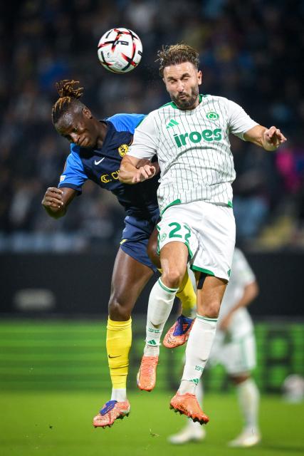 Omonia's forward #22 Muamer Tankovic (R) heads the ball away from Celje's midfielder #13 Papa Danielduring the UEFA Europa League, league phase matchday 2, football match between NK Celje and Omonoia at the Stadion Z'dezele in Celje, on October 15, 2026. (Photo by Jure Makovec / AFP)