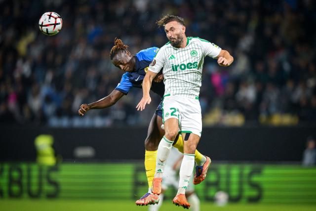 Omonia's forward #22 Muamer Tankovic (R) heads the ball away from Celje's midfielder #13 Papa Danielduring the UEFA Europa League, league phase matchday 2, football match between NK Celje and Omonoia at the Stadion Z'dezele in Celje, on October 15, 2026. (Photo by Jure Makovec / AFP)