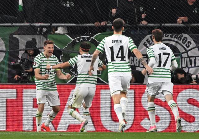 Ferencvaros' Norwegian midfielder #16 Kristoffer Zachariassen (L) celebrates scoring his team's first goal during the UEFA Europa League football match between Ferencvaros and Viktoria Plzen in Budapest, on October 15, 2026. (Photo by Attila KISBENEDEK / AFP)