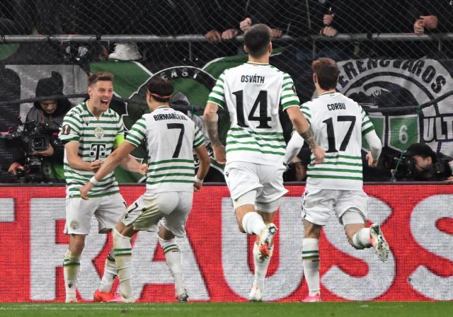 Ferencvaros' Norwegian midfielder #16 Kristoffer Zachariassen (L) celebrates scoring his team's first goal during the UEFA Europa League football match between Ferencvaros and Viktoria Plzen in Budapest, on October 15, 2026. (Photo by Attila KISBENEDEK / AFP)