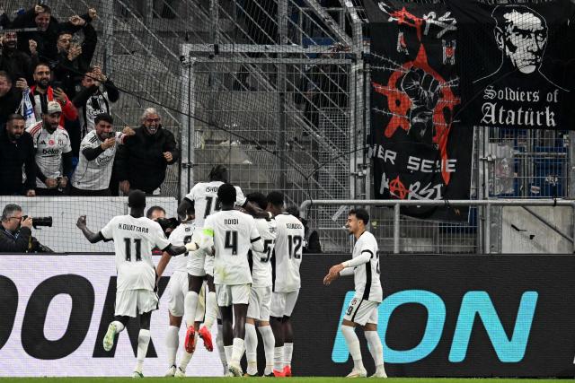 Besiktas' platers celebrate scoring the 1-0 goal during the UEFA Europa League football match between Hoffenheim and Besiktas in Sinsheim, on October 15, 2026. (Photo by THOMAS KIENZLE / AFP)