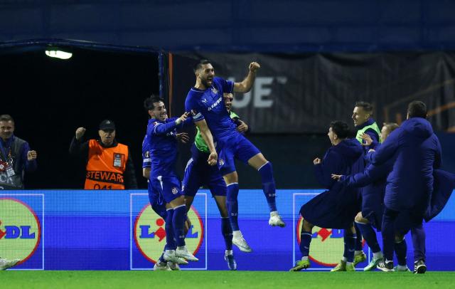 Dinamo players celebrate scoring a goal during the UEFA Europa League, league phase matchday 2, football match between Dinamo Zagreb and Anderlecht at the Stadion Maksimir in Zagreb, on October 15, 2026. (Photo by MARKO PERKOV / AFP)
