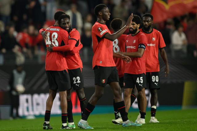 Rennes' players celebrate after victory in the UEFA Europa League, league phase matchday 2, football match between Stade Rennais and OFI Crete at the Roazhon Park in Rennes, western France on October 15, 2026. (Photo by Loic VENANCE / AFP)
