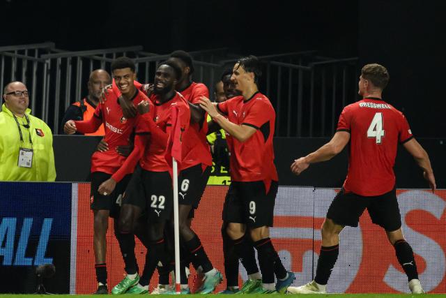 Rennes' Moroccan defender #48 Abdelhamid Ait Boudlal (L) celebrates with teammates after scoring the winning goal in the UEFA Europa League, league phase matchday 2, football match between Stade Rennais and OFI Crete at the Roazhon Park in Rennes, western France on October 15, 2026. (Photo by Loic VENANCE / AFP)