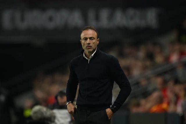 OFI Crete's head coach Christos Kontis looks on from the technical area during the UEFA Europa League, league phase matchday 2, football match between Stade Rennais and OFI Crete at the Roazhon Park in Rennes, western France on October 15, 2026. (Photo by Loic VENANCE / AFP)
