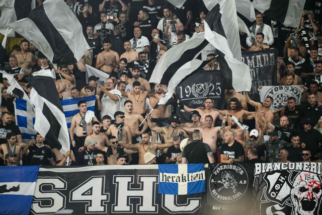 Ofi Crete supporters cheer their team on from the stands during the UEFA Europa League, league phase matchday 2, football match between Stade Rennais and OFI Crete at the Roazhon Park in Rennes, western France on October 15, 2026. (Photo by Loic VENANCE / AFP)