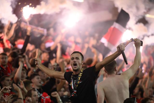 Rennes supporters cheer their team on from the stands during the UEFA Europa League, league phase matchday 2, football match between Stade Rennais and OFI Crete at the Roazhon Park in Rennes, western France on October 15, 2026. (Photo by Loic VENANCE / AFP)